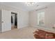 This bedroom is spacious with modern lighting and offers ample closet space at 222 N Weldon St, Gastonia, NC 28052