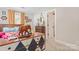 Bedroom featuring eclectic decor, warm lighting and stylish dresser at 222 N Weldon St, Gastonia, NC 28052