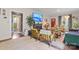 Cozy living area featuring hardwood floors, a fireplace, and abundant natural light at 222 N Weldon St, Gastonia, NC 28052