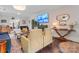 Spacious living room with an entertainment center, fireplace, and comfortable seating at 222 N Weldon St, Gastonia, NC 28052