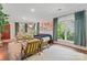 Stylish living room with a comfortable seating area and large windows at 222 N Weldon St, Gastonia, NC 28052