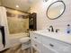 Bright bathroom with a shower and tub combination and a modern vanity at 233 Northwest Dr, Davidson, NC 28036