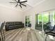 Bright living area with multiple sliding glass doors that lead to outdoor living spaces at 233 Northwest Dr, Davidson, NC 28036
