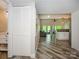 Open-concept with wood floors, vaulted ceilings, and a view of the outdoor deck at 233 Northwest Dr, Davidson, NC 28036