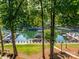 Picturesque waterfront view showcasing a marina filled with various boats and lush greenery at 233 Northwest Dr, Davidson, NC 28036