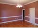Cozy bedroom with hardwood flooring and ample natural light at 2530 Sharon Rd, York, SC