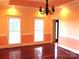 Formal dining area with hardwood floors, large windows, and detailed trim at 2530 Sharon Rd, York, SC