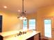 Kitchen featuring a center island, drop-down lighting, and a stainless steel refrigerator at 2530 Sharon Rd, York, SC