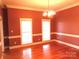 Living room with lots of natural light and hardwood flooring at 2530 Sharon Rd, York, SC