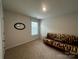 Bedroom with a fun futon, carpet flooring, window, and simple decor for a versatile space at 2554 Goose Fair Rd, Maiden, NC 28650