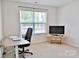 Study bedroom featuring hardwood floors, a desk, and a bright window at 2554 Goose Fair Rd, Maiden, NC 28650