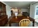 Spacious dining room flows into an open-concept kitchen and living area with plenty of natural light at 2554 Goose Fair Rd, Maiden, NC 28650