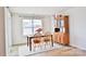 Dining area with wooden table, chairs, and a china cabinet at 2554 Goose Fair Rd, Maiden, NC 28650