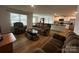 Bright living room with lots of windows, plush furniture, and an open layout at 2554 Goose Fair Rd, Maiden, NC 28650
