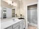 Bathroom with a white vanity, large mirror, and walk-in shower with glass doors at 2854 Harlinsdale Dr, Rock Hill, SC 29732