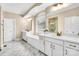 Bright bathroom with a soaking tub, double vanity, and marble floors for a spa-like experience at 2854 Harlinsdale Dr, Rock Hill, SC 29732