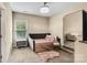 Bright bedroom featuring a daybed, plush rug and modern chandelier at 2854 Harlinsdale Dr, Rock Hill, SC 29732