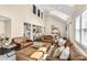 The expansive living room features soaring ceilings, plush seating, and stylish decor at 2854 Harlinsdale Dr, Rock Hill, SC 29732