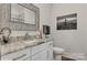 Bathroom with modern vanity, stylish mirror, and a decorative painting at 3006 Portico Pl # 37, Fort Mill, SC 29715