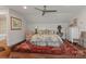 Bedroom with hardwood floors, large rug, upholstered chair, and a dresser at 3006 Portico Pl # 37, Fort Mill, SC 29715