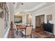 Cozy dining room featuring modern chandelier, hardwood floors, and abundant natural light at 3006 Portico Pl # 37, Fort Mill, SC 29715