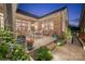 Charming patio featuring well-maintained landscaping, stone steps, and a comfortable dining area at 3006 Portico Pl # 37, Fort Mill, SC 29715