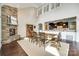Dining room with high ceilings, hardwood floors, and open access to kitchen at 308 Hollister Estates Dr, Waxhaw, NC 28173