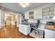 Bright office features hardwood floors, custom built-ins, and ample workspace at 308 Hollister Estates Dr, Waxhaw, NC 28173