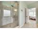 Spa-like bathroom offers a tiled shower with a bench seat and glass enclosure at 308 Hollister Estates Dr, Waxhaw, NC 28173
