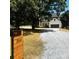 Exterior of a modern farmhouse with white siding, dark accents, and a gravel driveway at 3114 Ansonville Rd, Marshville, NC 28103