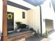 Welcoming porch with a black front door adorned with a wreath, bench, and address number 3114 at 3114 Ansonville Rd, Marshville, NC 28103