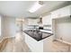 Open concept kitchen features granite countertops, stainless steel appliances and ample counter space at 317 Berry Trl, Wadesboro, NC 28170