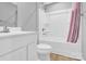 Bathroom with a shower-tub combo, single sink vanity, and standard toilet at 3212 Coast Oak Rd, Charlotte, NC 28214