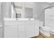 Bathroom featuring double sink vanity, a large mirror, and a toilet at 3212 Coast Oak Rd, Charlotte, NC 28214