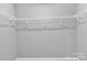 Walk-in closet with wire shelving for organized storage at 3212 Coast Oak Rd, Charlotte, NC 28214