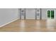 Open concept living room with hardwood floors and lots of natural light at 3212 Coast Oak Rd, Charlotte, NC 28214
