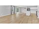 Open concept living room with hardwood floors and lots of natural light at 3212 Coast Oak Rd, Charlotte, NC 28214
