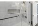 Modern bathroom featuring a glass-enclosed shower, black fixtures, and marble tile at 32507 Buchanan Ln, Albemarle, NC 28001