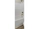 A modern bathroom showcasing a white bathtub and gold hardware for a luxurious feel at 32507 Buchanan Ln, Albemarle, NC 28001