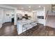 Modern kitchen with stainless steel appliances, a large island and bar stool seating at 4210 Steel Way, Sherrills Ford, NC 28673