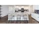 Modern kitchen featuring stainless steel appliances, a large island, and stylish bar stools at 4210 Steel Way, Sherrills Ford, NC 28673