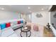 Open living room area with modern furniture and movie-themed decorations at 4210 Steel Way, Sherrills Ford, NC 28673