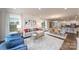 Open-concept living area with a seamless flow into the dining area and kitchen, perfect for entertaining at 4210 Steel Way, Sherrills Ford, NC 28673