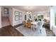 Spacious dining area with a chandelier, hardwood floors, and natural light at 4212 Steel Way, Sherrills Ford, NC 28673
