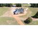 New construction home with charming architecture, paved driveway, and attractive color scheme set on a large lot at 4648 Simpson Rd, Edgemoor, SC 29712