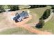 New construction home with charming architecture, paved driveway, and attractive color scheme set on a large lot at 4648 Simpson Rd, Edgemoor, SC 29712