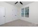 Bright bedroom featuring neutral carpet, closet, and large window offering plenty of natural light at 4648 Simpson Rd, Edgemoor, SC 29712