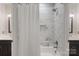 Bright bathroom features a shower/tub combo and double sinks at 4877 River Hills Dr, Denver, NC 28037