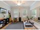 Bright exercise room with wood floors, rubber mat, and modern fitness equipment at 4877 River Hills Dr, Denver, NC 28037