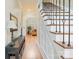 Hallway with wooden floors and decor leading into the home at 4877 River Hills Dr, Denver, NC 28037